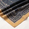 Black geometric printed ladies dupatta with decorative traditional patterns and golden border
