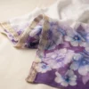 Purple floral printed ladies dupatta with white flowers and golden decorative border
